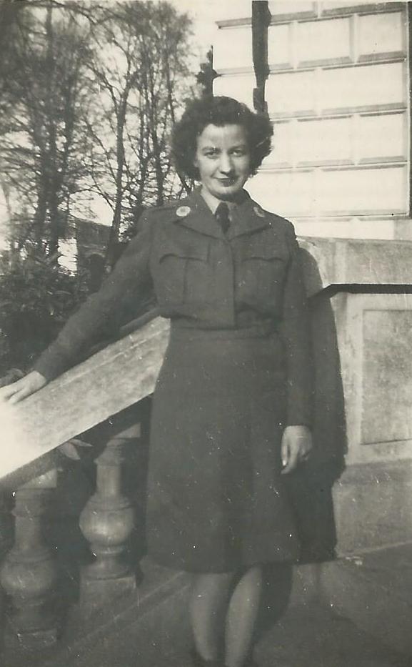 Lilian Harvey on the steps of the building at Versailles where James McNitt worked