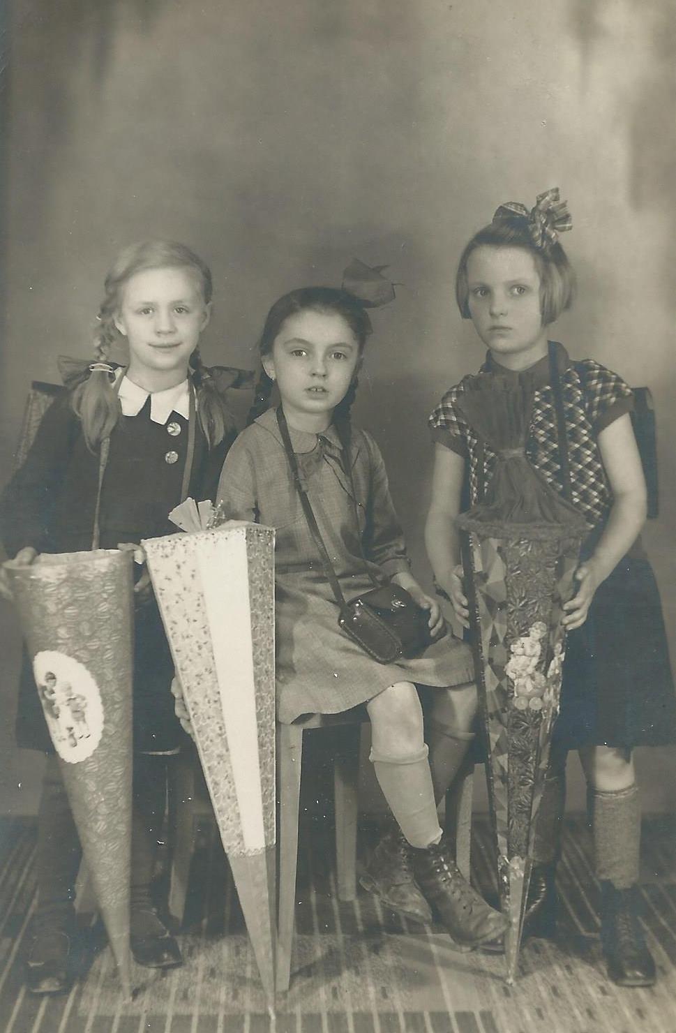 Ruth Weinmann with cousins Rosemary Gunderrman and Johanna May pose with their schultutes