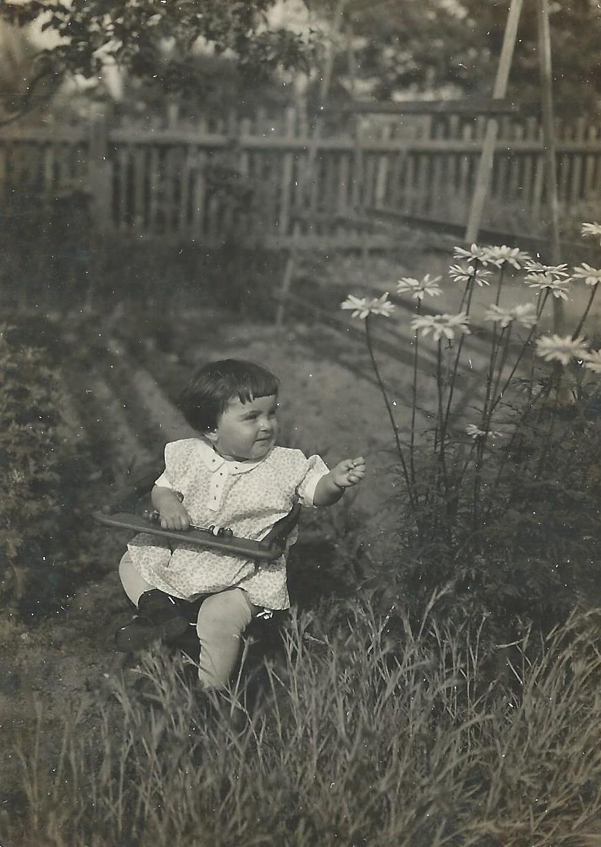 Ruth Weinmann in her grandparents' garden in Wolfen, Germany